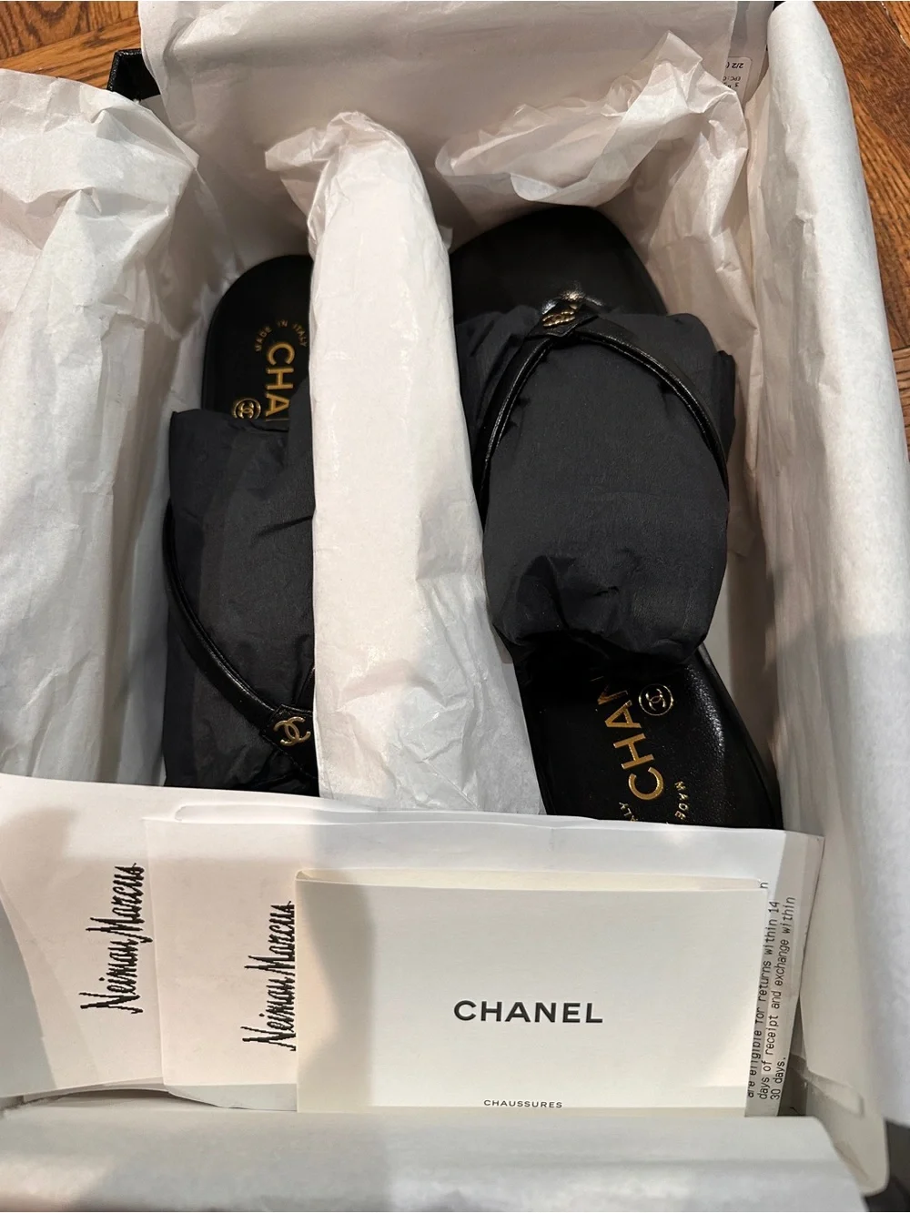 CHANEL Black Leather Logo Thong Sandals with Gold Accent